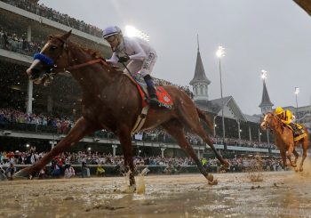Justify makes history in wettest ever Kentucky Derby
